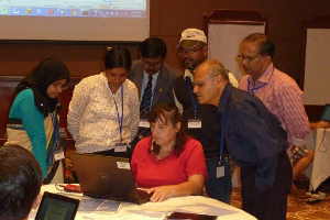 CSIRO Team member Donna Hayes showing participants Geomorphological features for one of the regions in the GIS. From Left to Right Ms Yasmin Ara Ahmad, Dr Gejo Anna Geevarghese, Mr Sarajit Kumar, Dr Mohammed Ashraful Azam Khan, Dr S Prasanna Kumar, Dr K.Sunil Mohamed