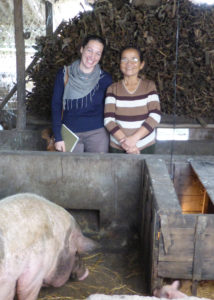Tarnie Cooper revisiting a pig farmer in Hue, Vietnam